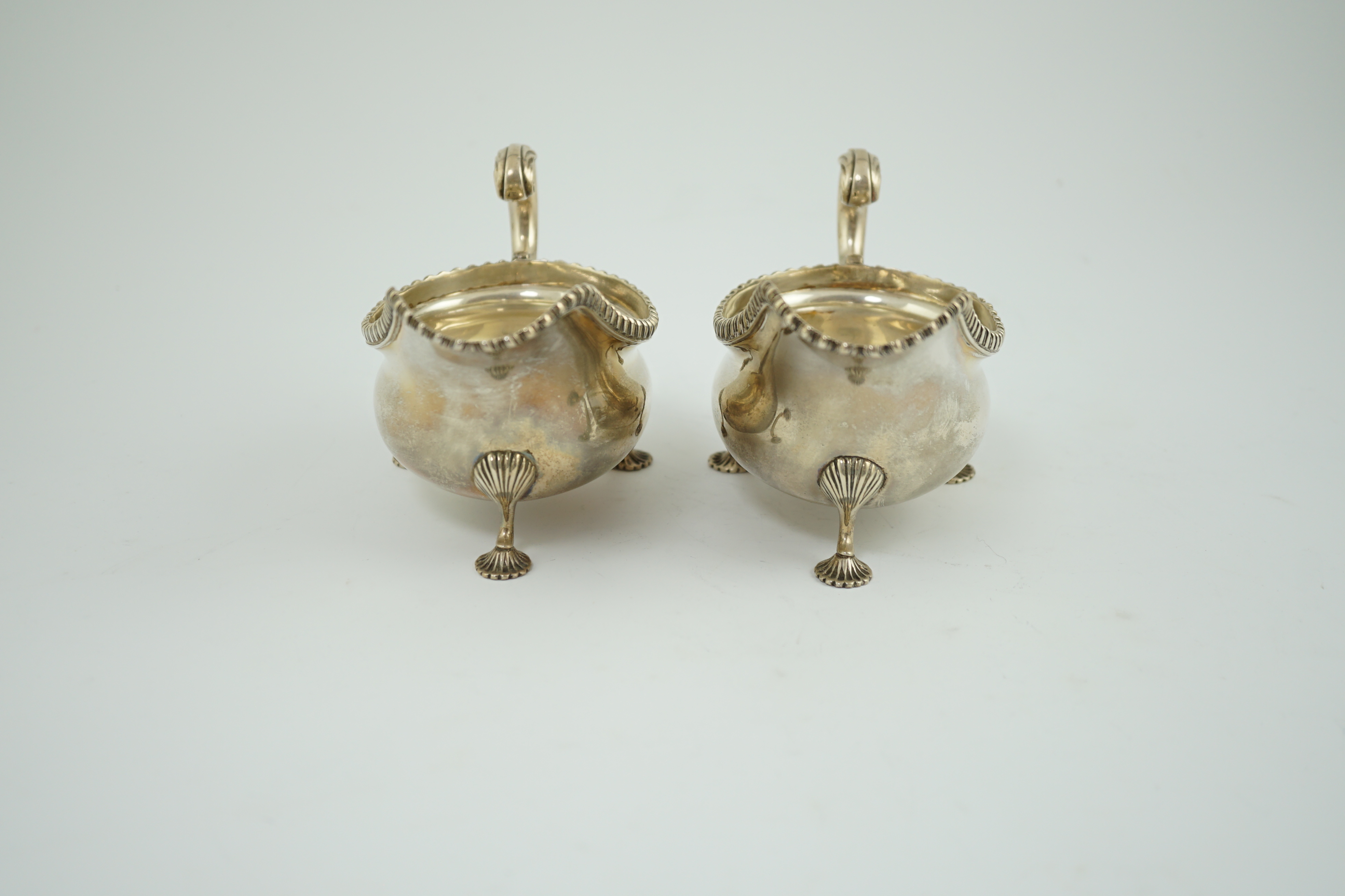 A pair of Edwardian silver sauce boats, by Goldsmiths & Silversmiths Co Ltd